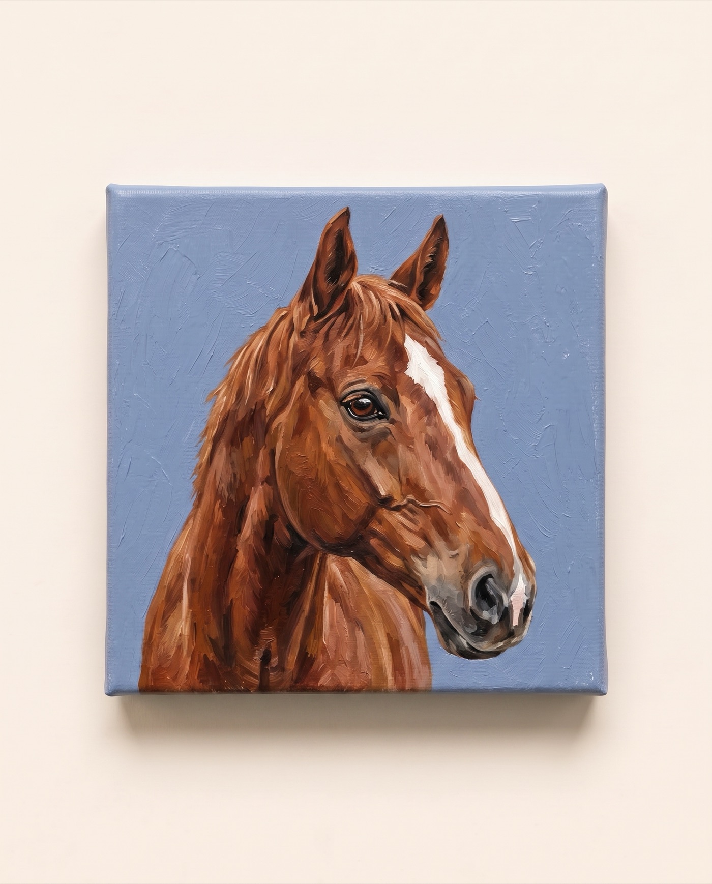 Acrylic painting of a chestnut horse head on a small square canvas, photographed on cream paper
